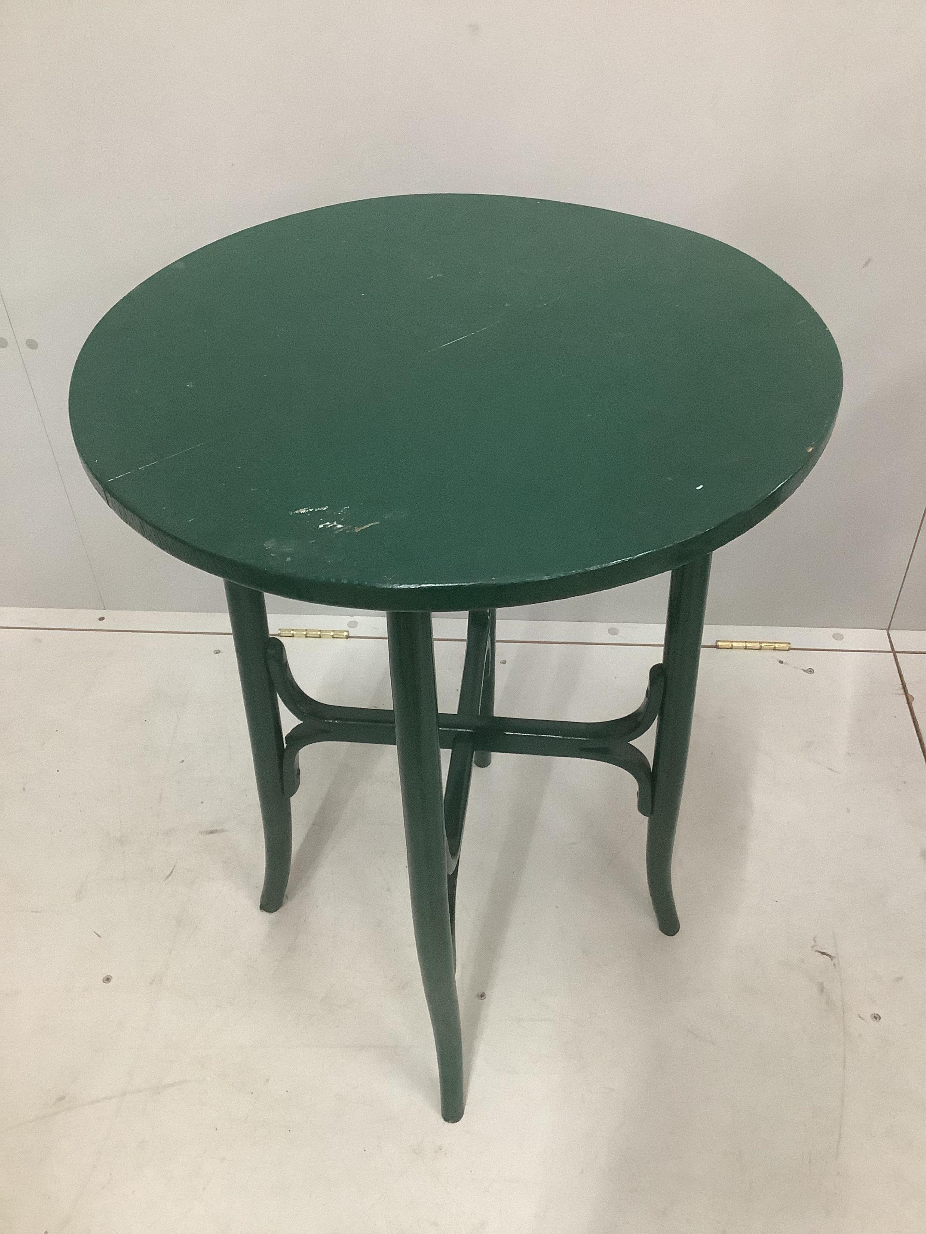 An early 20th century Thonet style circular painted occasional table, diameter 54cm, height 78cm. Condition - fair